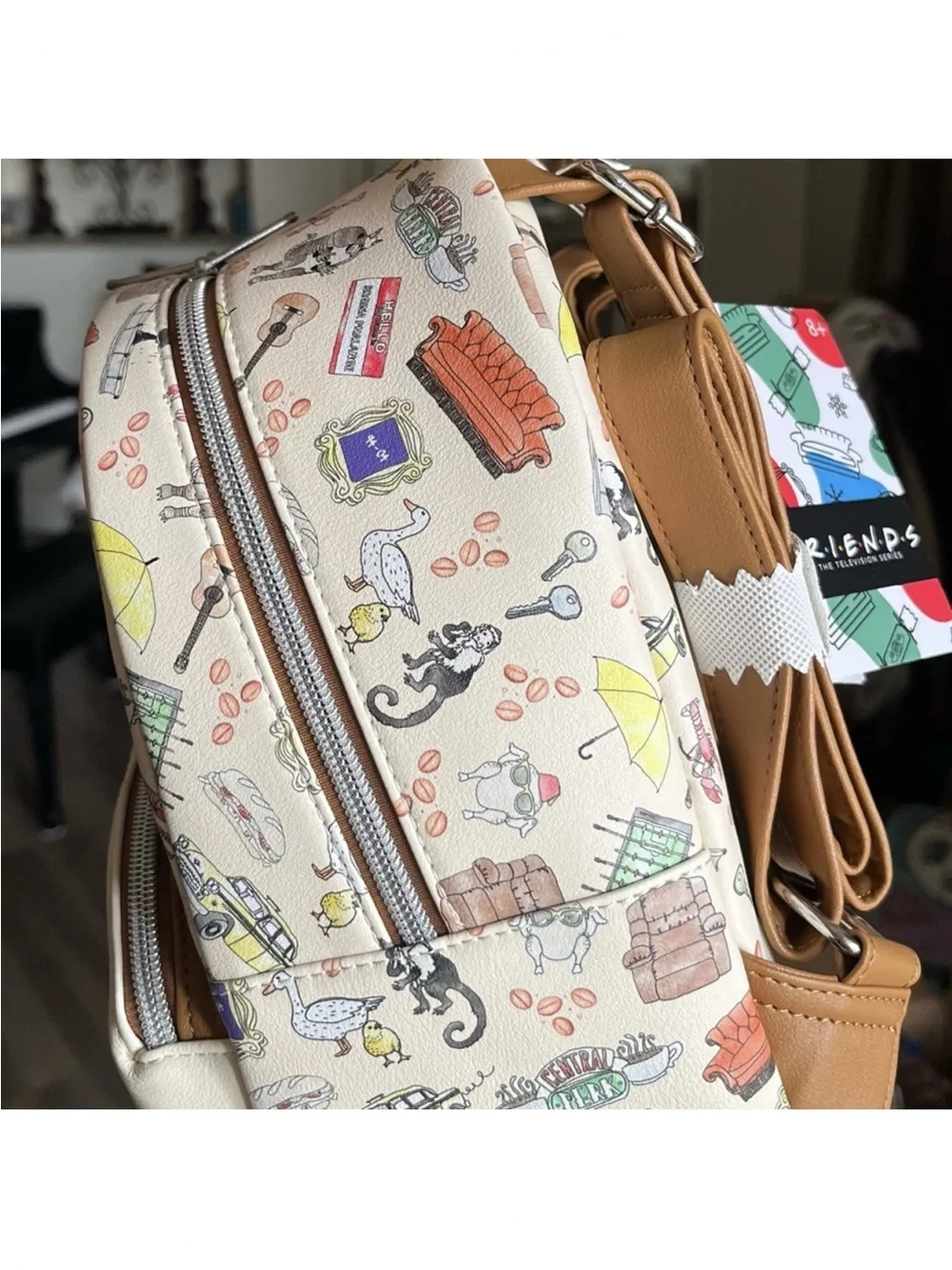Loungefly Friends Cream and Orange Friends Backpack
